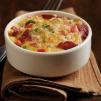 Creamy Couscous Mac & Cheese · Israeli couscous | jack + cheddar cheese sauce | applewood smoked bacon | tomatoes | green o...