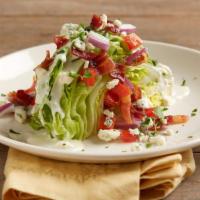 House Wedge Salad · Iceberg lettuce | bleu cheese crumbles | applewood smoked bacon | diced tomatoes | red onion...