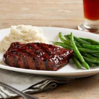 Slow-Roasted Tri-Tip* · 8 oz. slow-roasted sirloin tri-tip glazed with BJ's Peppered BBQ sauce | choice of two signa...
