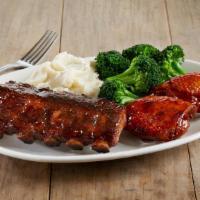 Baby Back Ribs & Chicken Thighs Combo · Half rack of baby back pork ribs glazed with BJ's Peppered BBQ sauce | two slow-roasted, lig...