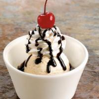 Kids' Sundae · One scoop of rich vanilla bean ice cream | chocolate syrup | whipped cream | a cherry on top