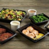 Tri-Tip & Salmon Bundle · 18 oz. Tri-Tip | 2 Salmon Fillets | 2 Family-Sized Sides | 1 Family-Sized Salad  Serves 4