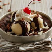 Hot Fudge Brownie Pizookie ® · Warm, gooey brownie | rich vanilla bean ice cream | dark chocolate hot fudge | toasted pecan...