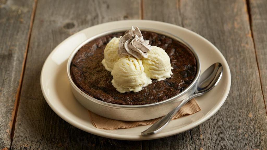 Cookies 'N' Cream Pizookie® · Rich chocolate cookie with the taste of Oreo® cookies | rich vanilla bean ice cream | a dollop of mousse