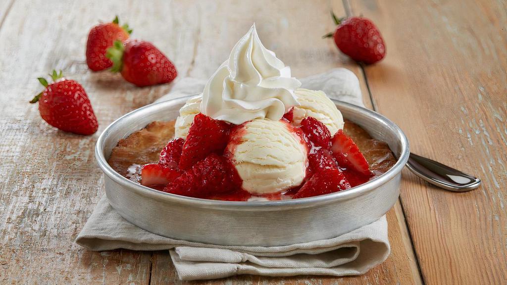 Strawberry Shortcake Pizookie® · Buttery sugar cookie | fresh strawberries | strawberry purée | rich vanilla bean ice cream | whipped cream
