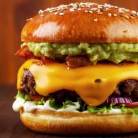 Halal Avocado Cheeseburger · Fresh cut avocados with two 100% halal angus beef patties, lettuce, american cheese, red tom...