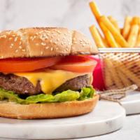 Halal Cheeseburger · Two 100% halal angus beef patties with american cheese, lettuce, tomatoes, red onions, pickl...