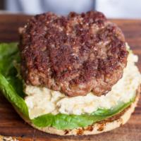Halal Artichoke Cheeseburger · Fresh diced artichoke topped with two fresh halal angus beef patties, lettuce, american chee...