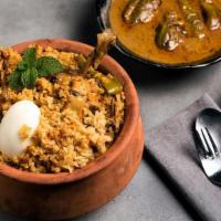 FB's Kodi (Chicken) Biryani · Spicy basmati rice cooked in biryani spices herbs and juicy chicken leg pieces
