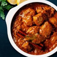 Fb'S Chicken Tikka Masala · Marinated chicken cooked with sliced onion and bell peppers with tomato sauce and a touch of...
