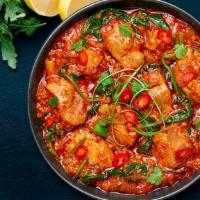 Chicken Vindaloo · Chicken and potatoes sautéed in a spicy, tangy sauce.