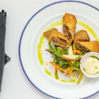 Spring Rolls Philly Cheese Steak · Served with creamy horseradish sauce.