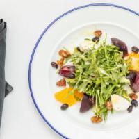 Beet Salad · Arugula with roasted red beets, walnuts, dried cranberries, goat cheese and lemon citrus dre...