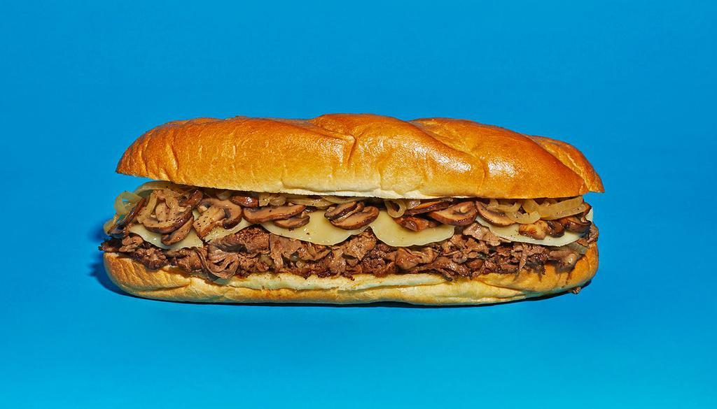 Mushroom Cheesesteak · Sliced steak with melted provolone, grilled onions, and sauteed mushrooms on a hoagie roll.