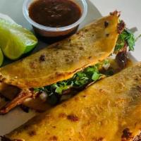 Tacos · Carne de su preferencia, cebolla, cilantro, limón, rábanos y salsa. / Your choice of meat, w...