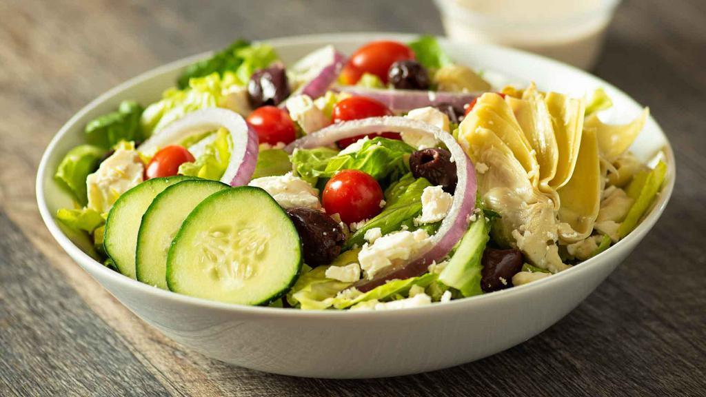 Greek Salad · Lettuce, onions, kalamata olives, feta cheese, artichokes & tomatoes.