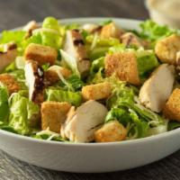 Chicken Caesar Salad · Grilled chicken, Romaine lettuce, garlic croutons, parmesan & a great classic Caesar dressing