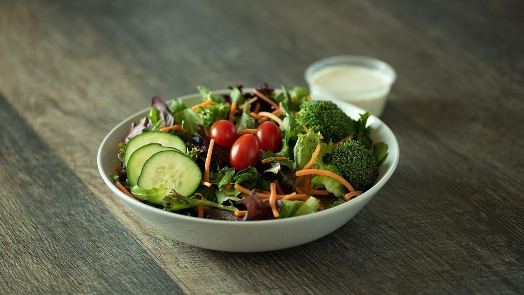 Mixed Greens Salad · Formerly known as Seasonal Greens.  Mixed baby greens, carrots, cucumbers, tomatoes & broccoli.
