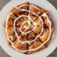 Cinna Bomb · Pizza dough with buttery cinnamon, topped with a vanilla glaze.