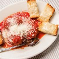 Spicy Meatballs · Tomato sauce, parmesan, garlic bread.