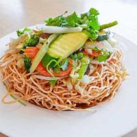 28. Stir-Fried Vegetable Chow Mein /  Mi Xao Mem · Stir-fried garlic with wheat noodle, mixed vegetable, tofu, and mushroom.