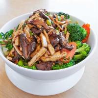 29. Gourmet House Noodle / Mi Kho · Sautéed tofu, shitake mushroom with seasoning wheat noodle, broccoli, and carrot.