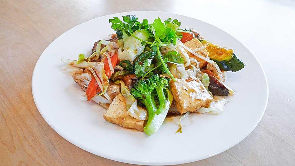 30. Crispy Chow Mein /  Mi Xao Gion · Crispy wheat noodle w/mixed vegetable, tofu, and mushroom in garlic sauce.