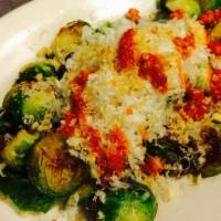 Organic Brussels Sprouts · Parmesan, garlic bread crumbs, Calabrian chile.