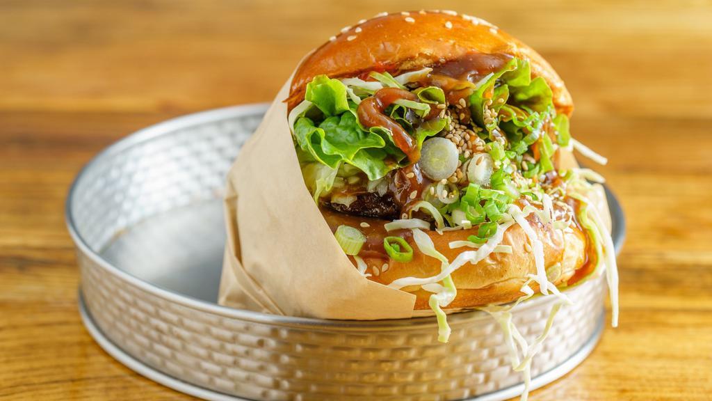 Menchi Katsu Burger · Pork patty covered in breadcrumbs, then deep-fried ,cabbage .peanut lemon  sauce