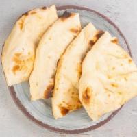 Tandoori Naan (V) by Zareen's · By Zareen's. Hot from our clay oven. Contains gluten, dairy, and eggs. We cannot make substi...