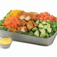 Chicken Tender Strip Salad · Lettuce mix topped with diced tomatoes, carrots, cucumbers, shredded cheese and two diced ch...