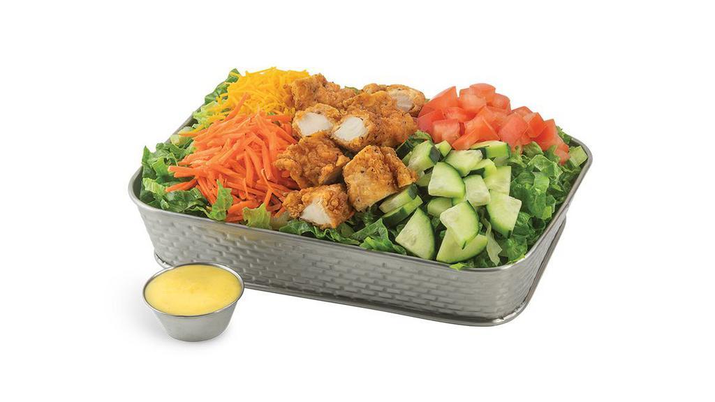 Chicken Tender Strip Salad · Lettuce mix topped with diced tomatoes, carrots, cucumbers, shredded cheese and two diced chicken tender strips. Served with a side of honey mustard or buttermilk ranch.