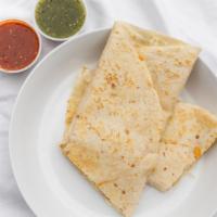 Super Quesadilla · Flour tortilla with melted cheese, choice of meat, onion, cilantro, hot or mild salsa, guaca...