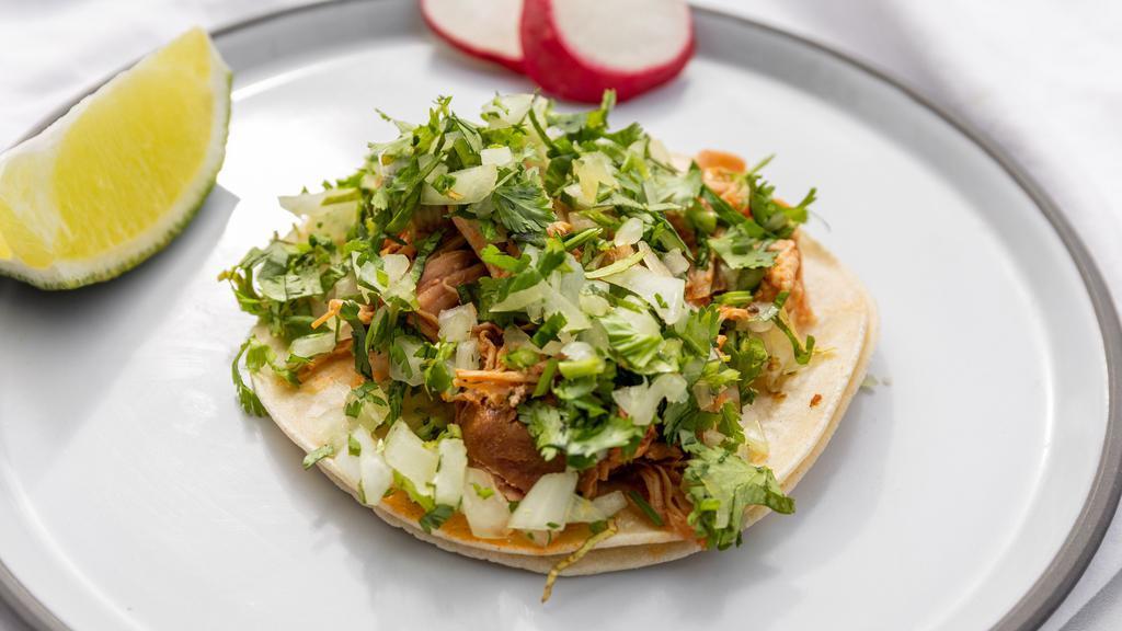 Regular Taco · Choice of meat, onions, cilantro, and your choice of hot or mild salsa.