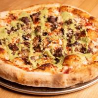 Championes Y Salchicha Pizza · House-made beef sausage, mushrooms, garlic, cotija and spicy green salsa with tomato sauce.