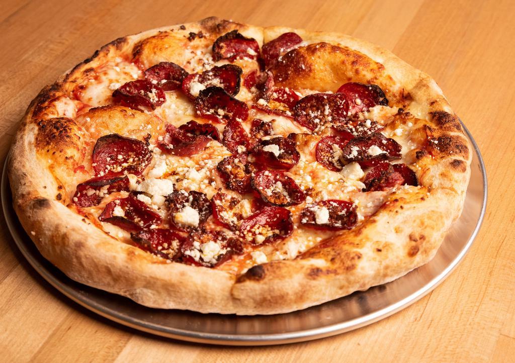 Double Pepperoni Pizza · Double beef pepperoni and cotija cheese with tomato sauce.