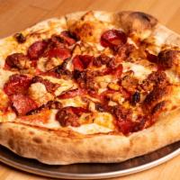 Carne Pizza · Beef pepperoni, house made beef chorizo and chicken with tomato sauce.