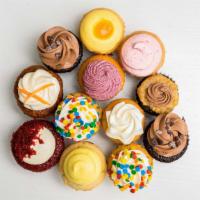 One Dozen Mini Assortment · One dozen assorted mini cupcakes including at least one of every flavor.