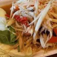 Laos Papaya Salad / ส้มตำมิตรภาพไทยลาว · Shredded green papaya with green beans, tomato in spicy fresh lime juice Salted Crab and Fer...