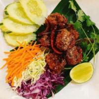Larb Moo Tod / ลาบหมูทอด · Deep Fried Minced Pork Balls Isarn style Spicy with rice powder, mint, onions, and fresh lim...