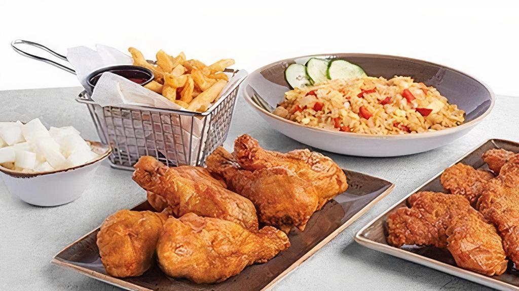 Family Meal · 12 wings (bone-in or boneless), 6 drums, choice of 2 sides and choice of white rice or plain fried rice.
