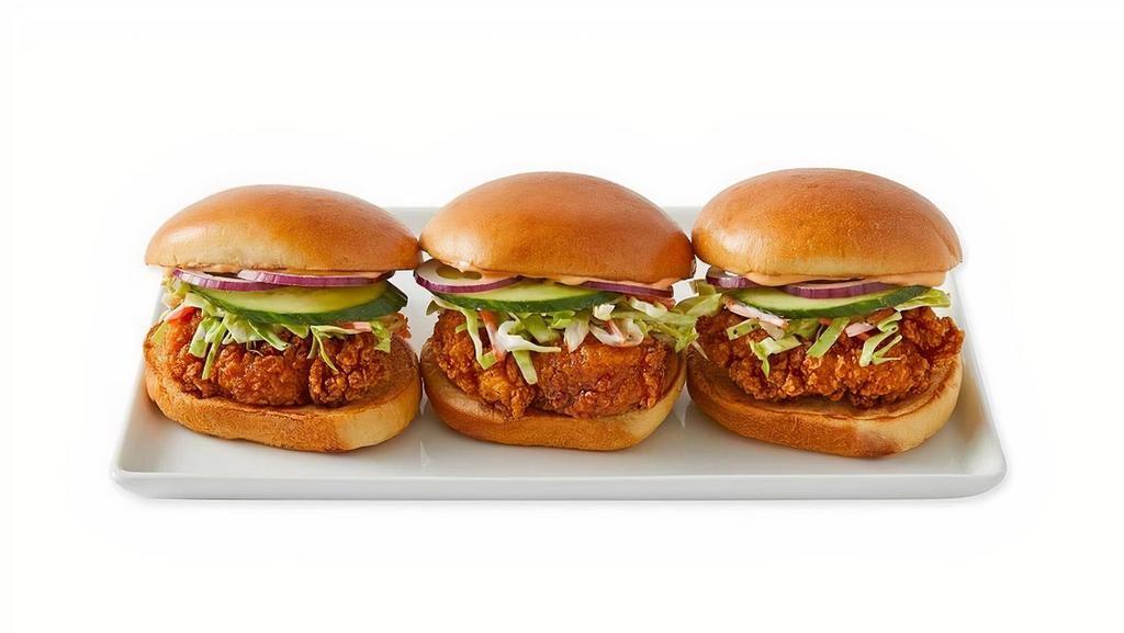 Sliders · Crispy chicken or marinated ribeye, coleslaw, cucumber, red onions, and spicy mayo, served on a mini potato bun. 930-1130 cal.