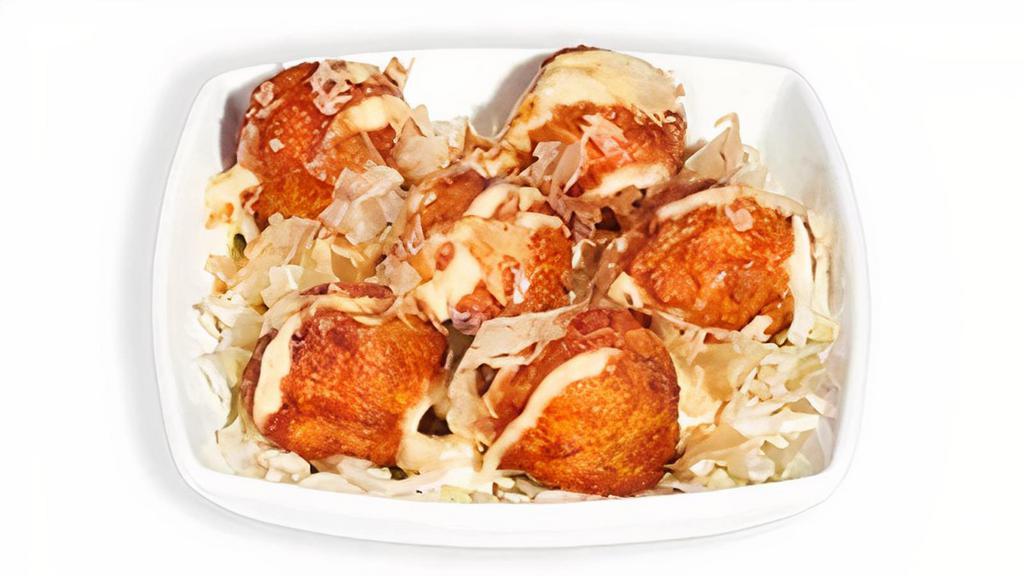Takoyaki · Fried octopus dumplings drizzled with Japanese mayonnaise, katsu sauce, and sprinkled with bonito flakes. 342 cal.