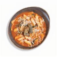 Tteokbokki · Rice cakes simmered in spicy sauce with fish cakes, scallions, and onions topped with mozzar...