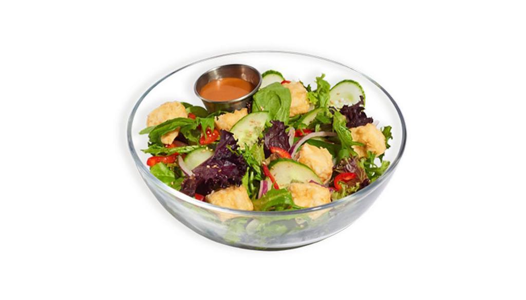 Sesame Ginger Salad · Spring mix, onions, sesame seeds, red bell peppers, and cucumbers topped with a sesame ginger dressing and your choice of protein. 475 - 1030 cal.