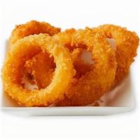 Onion Rings · Thick slices of onions in a crunchy batter served golden brown.  680 cal.