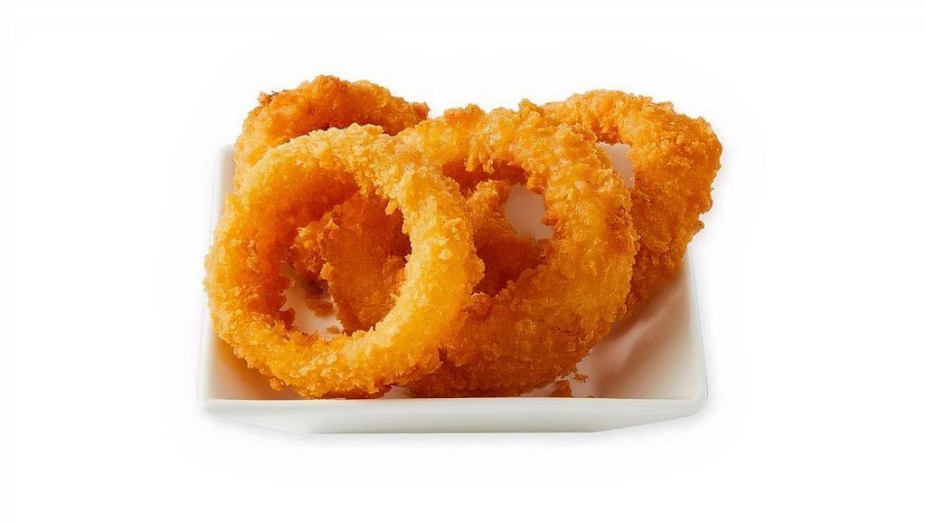 Onion Rings · Thick slices of onions in a crunchy batter served golden brown.  680 cal.