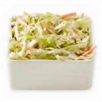 Coleslaw · Shredded cabbage and carrots fused with a sweet and creamy mayo-based sauce. 120 cal.
