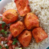 13. Chicken Tikka Kabab · Boneless chicken cubes cooked in charcoal tandoor.