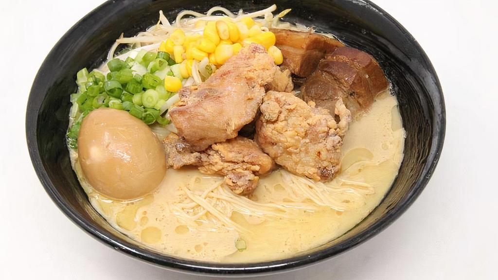 Chicken Ramen Deluxe · Clear and rich chicken soup and salt flavor. 3 pieces of karaage, 2 pieces of kakuni (pork belly), green onion, bean sprout, boiled egg, and corn.